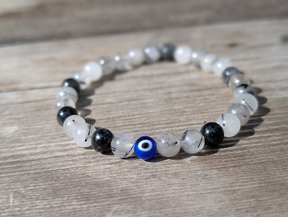 Thumbnail: Tourmalinated Quartz Protection Bracelet 6mm by Evil Eye Tarot.