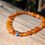 Thumbnail: Carnelian Passion Bracelet 6mm by Evil Eye Tarot.