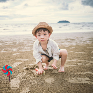 Boy playing sand