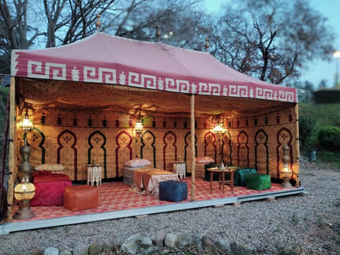 a tent with a greek key pattern on it