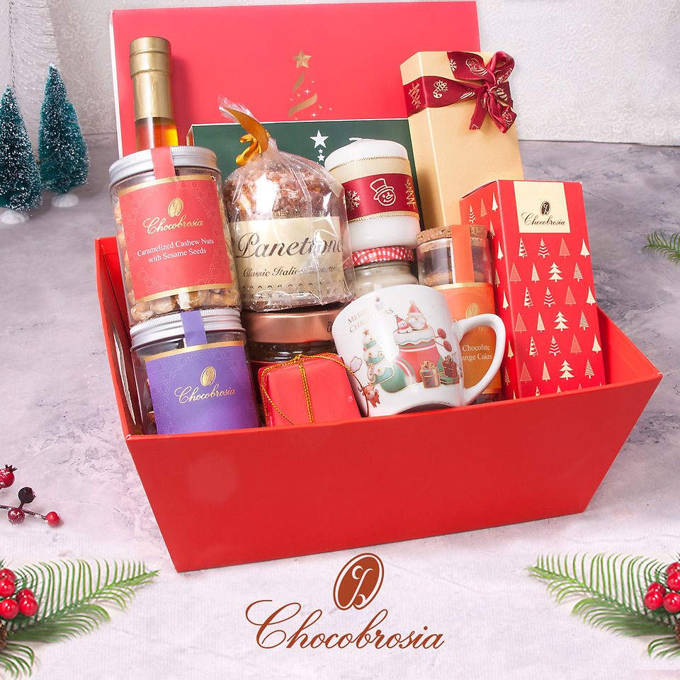Christmas Gift hamper basket with handmade Christmas sweets, Christmas chocolates, olive oil, candles and Christmas dried fruits for X’mas corporate gifting, Xmas personal gifting and VIP Christmas gifts