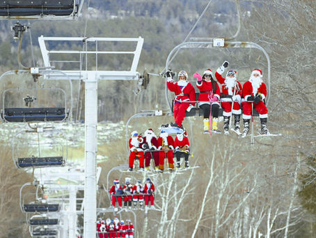 Over 200 skiers and snowboarders hit the slopes at Sunday River dressed as Santa