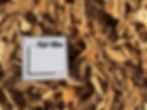 Close-up of engineered playground chips showing sizing scale