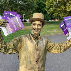 Photo of David Underhill as The Golden Boy, busking in Nanaimo BC.