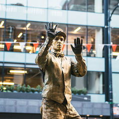 Photo of David Underhill as The Golden Boy, busking in Vancouver BC.