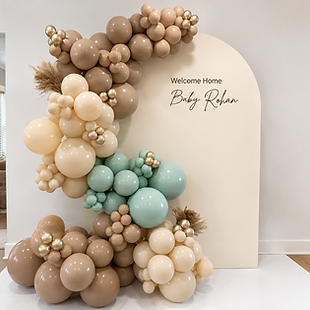 custom blue and tan balloon garland and backdrop display designed for a baby shower