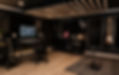 Music production studio in Stony Brook featuring recording equipment, instruments, and rehearsal space for musicians and bands