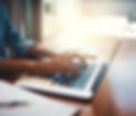 person typing on laptop cirigliano agency