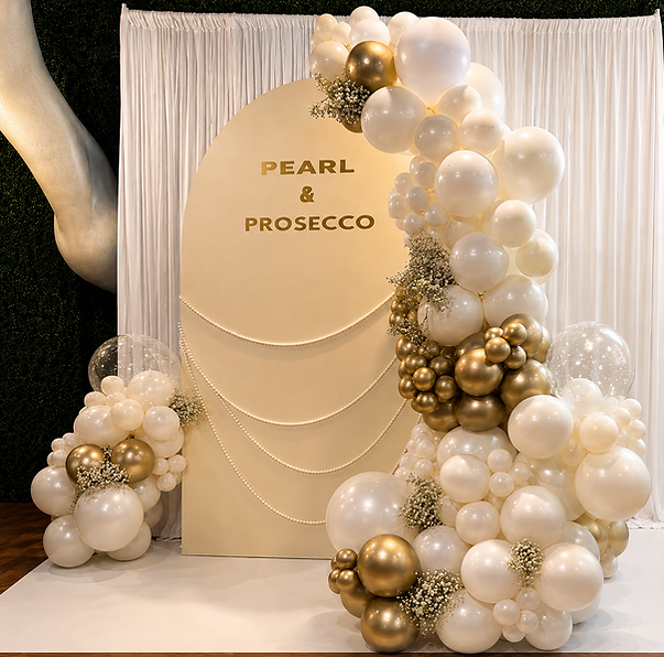 Elegant pearl and gold balloon garland and backdrop display designed for a bridal shower