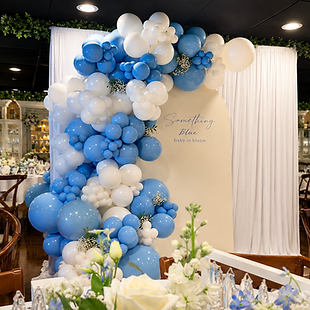 luxury balloon garland and backdrop display designed for a bridal shower something blue theme