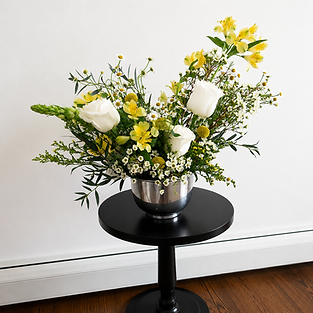 Handcrafted yellow and white rose floral centerpiece designed for weddings, showers, and private celebrations