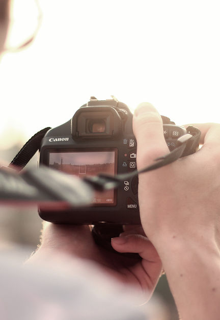 cámara hombre que toma foto fotógrafo