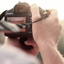 man camera taking photo photographer