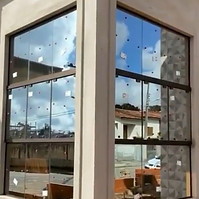 Fachada de Maxiar refletivo bronze