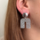 Miniature : Boucles d'oreilles argentées scintillantes, style moderne