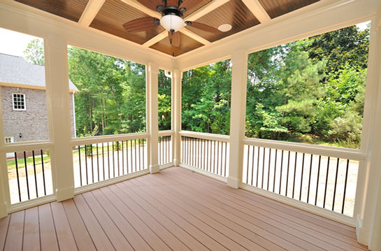 Newly finished deck addition to house