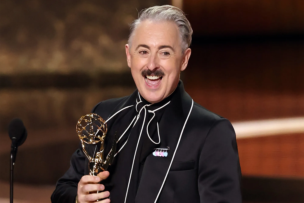 Alan Cumming accepting the Emmy for 'The Traitors'.