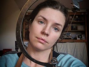 close up of a woman using jewellery crafting tools