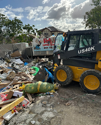 rubbish removal with a bobcat in south yarra