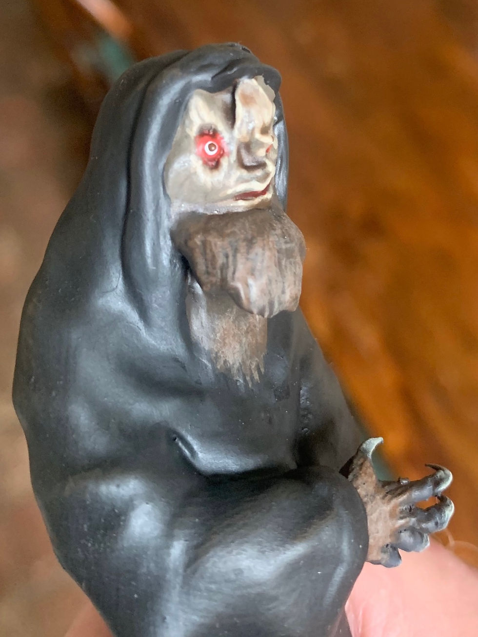 Thumbnail: the blood on satan's claw satan's skin model figure side close-up