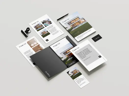 Verschiedene Werbemittel wie Flyer, Visitenkarten, Briefpapier und Mappen des Projektes EstateElevation