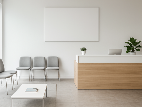 Modern, clean office reception area with chairs and front desk
