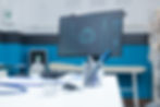 empty-doctor-office-with-computer-having-anatomical-body-skeleton-radiography-computer-scr