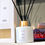 Thumbnail: white room diffuser in white bottle with gold lid and bow