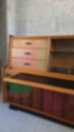 Teak sideboard showing pull out shelf