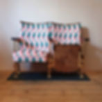 Two seater vintage cinema seats in geometric Neo Melon velvet fabric