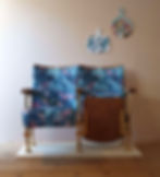 Set of two refurbished vintage cinema seats finished in Woodchip & Magnolia's Lush teal and coral velvet
