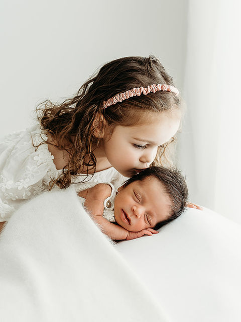 Beautiful family photography in a natural light garden studio in Esher Surrey
