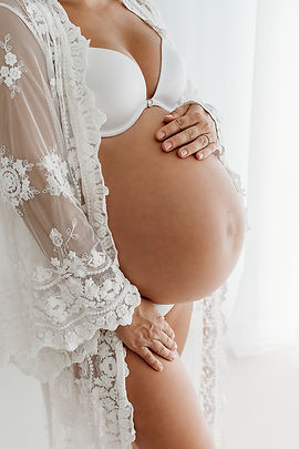 Beautiful Maternity photography in a natural light garden studio in Esher Surrey

