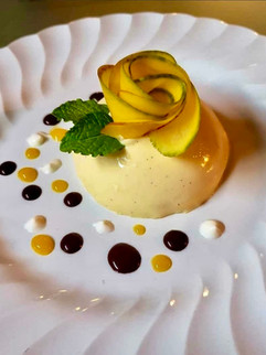 Mango panna cotta with magician & chocolate sauce