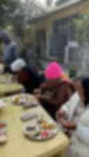 Elderly residents at Sunrise Foundation old age home enjoying a peaceful group lunch together