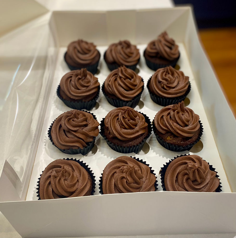 Thumbnail: Triple Choc Brownie Cupcakes topped with our delectable Chocolate Buttercream.  Perfect for your next celebration.