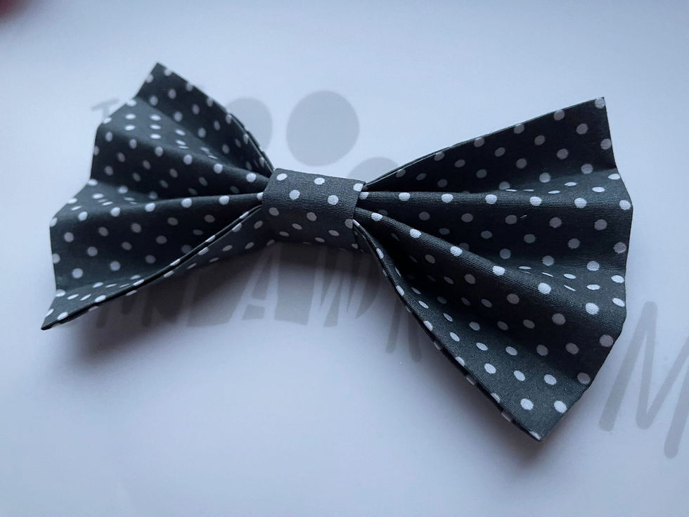 A grey polka dot pet collar bow tie