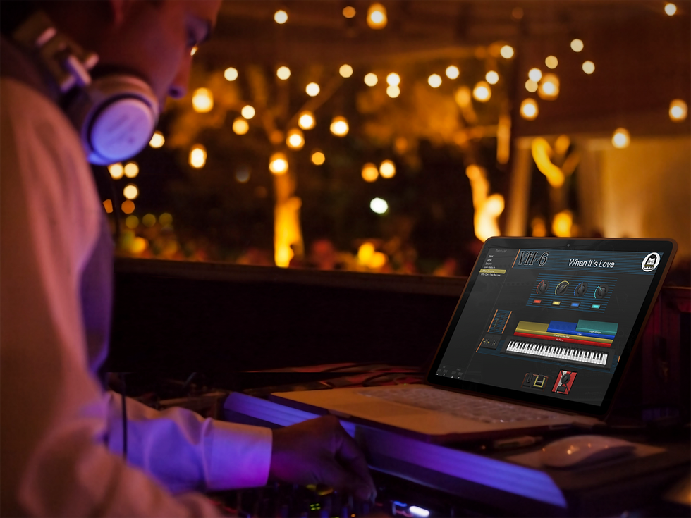 macbook-pro-mockup-template-of-dj-at-a-party.png
