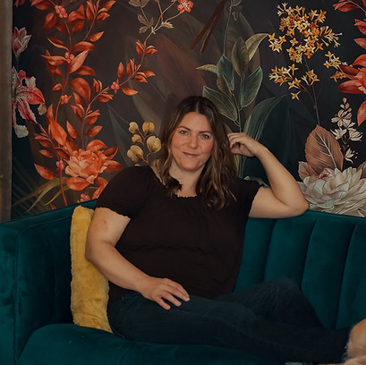 Bobbi Gorsalitz sitting on couch