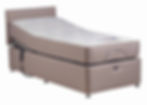 Adjustable beige hospital bed with mattress
