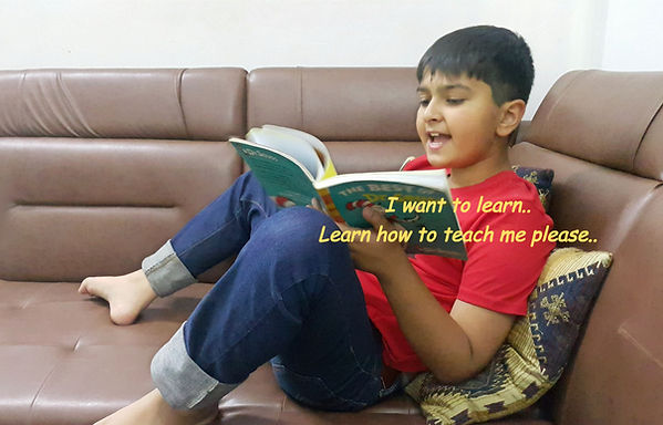 Autistic boy reading a book