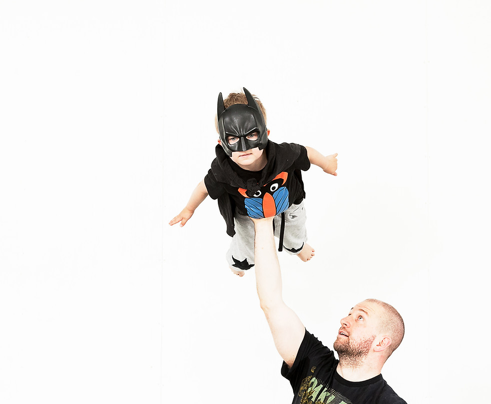 Dancer Mandelin lifts his son Urho. Photo by: Aino Huovio