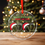 Thumbnail: A round glass Christmas ornament with a single baby footprint wearing a Santa hat, and the text "MERRY CHRISTMAS MOMMY AND DA
