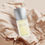 Miniatura: Vista superior frasco acostado perfume Issey Miyake Pour Homme de 125ml en fondo tela beige