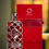 Miniatura: Vista frontal frasco perfume Amber Rouge Orientica de 80ml junto a su caja original
