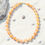 Thumbnail: Handcrafted peach moonstone beaded necklace with gold-filled accents