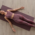 fitness-woman-doing-yoga-yoga-mat-home.jpg