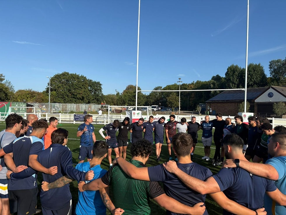 Head Coach Liam Dunseath with the young men of Cyprus