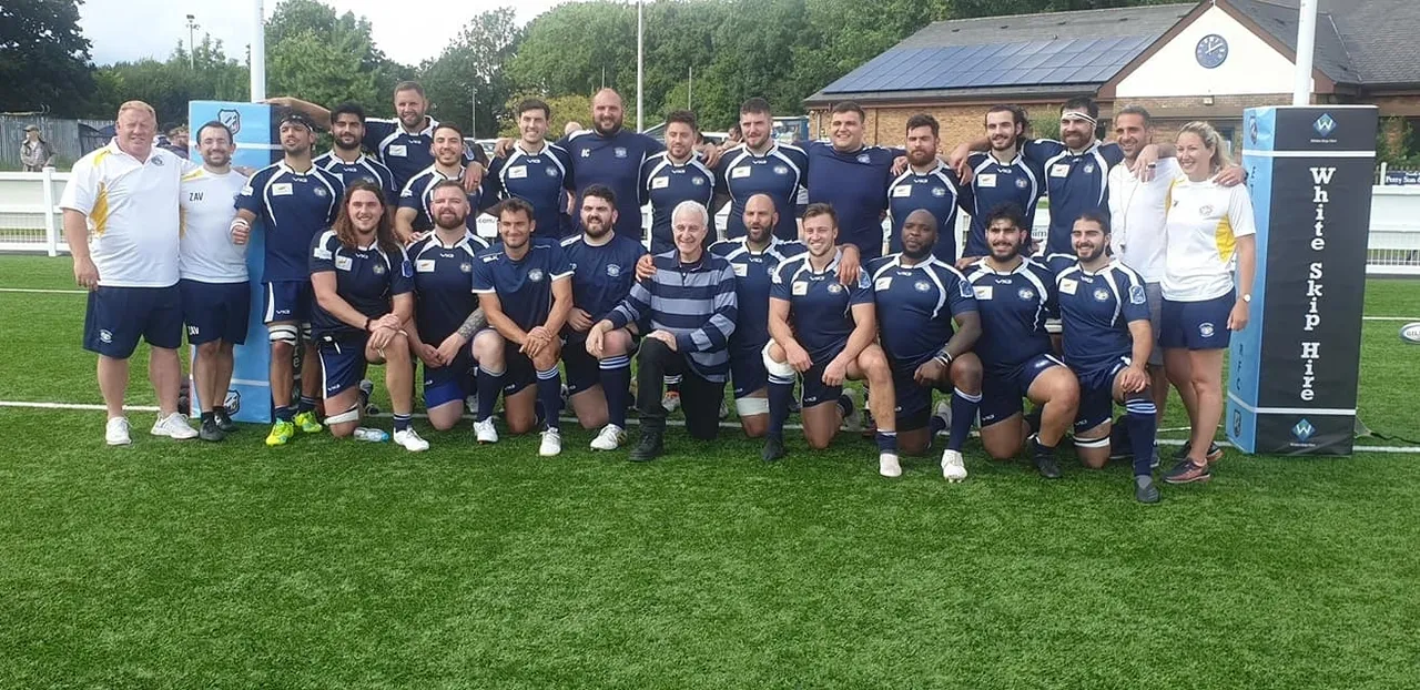 The squad with Cyprus High Commissioner Andreas Kakouris - Photo credit Parikiaki Newspaper
