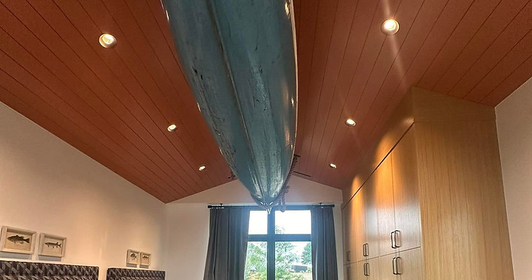 Stained wood ceiling and stained cabinetry
